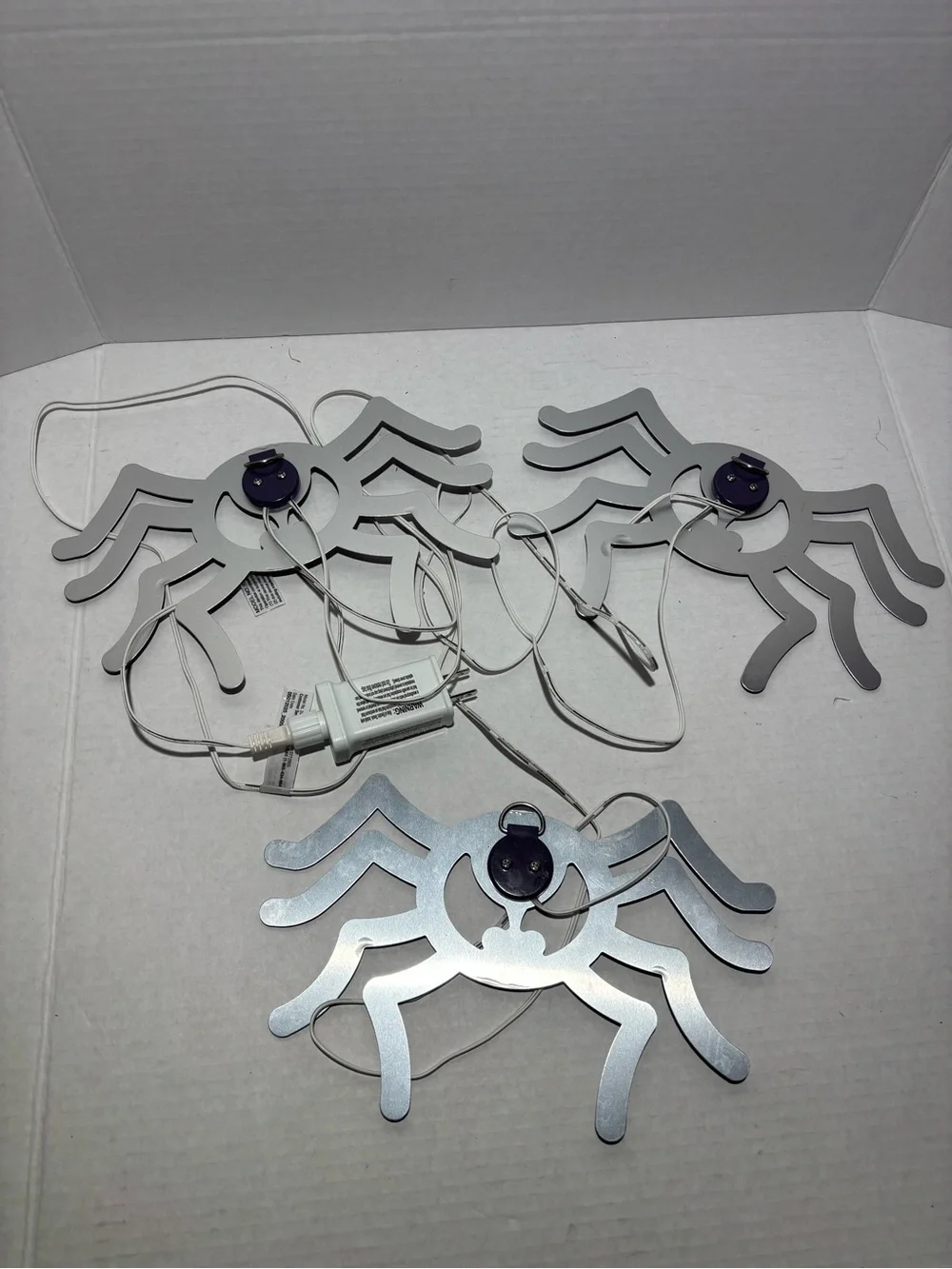10 in Purple Twinkling LED Spiders - 3 Pack